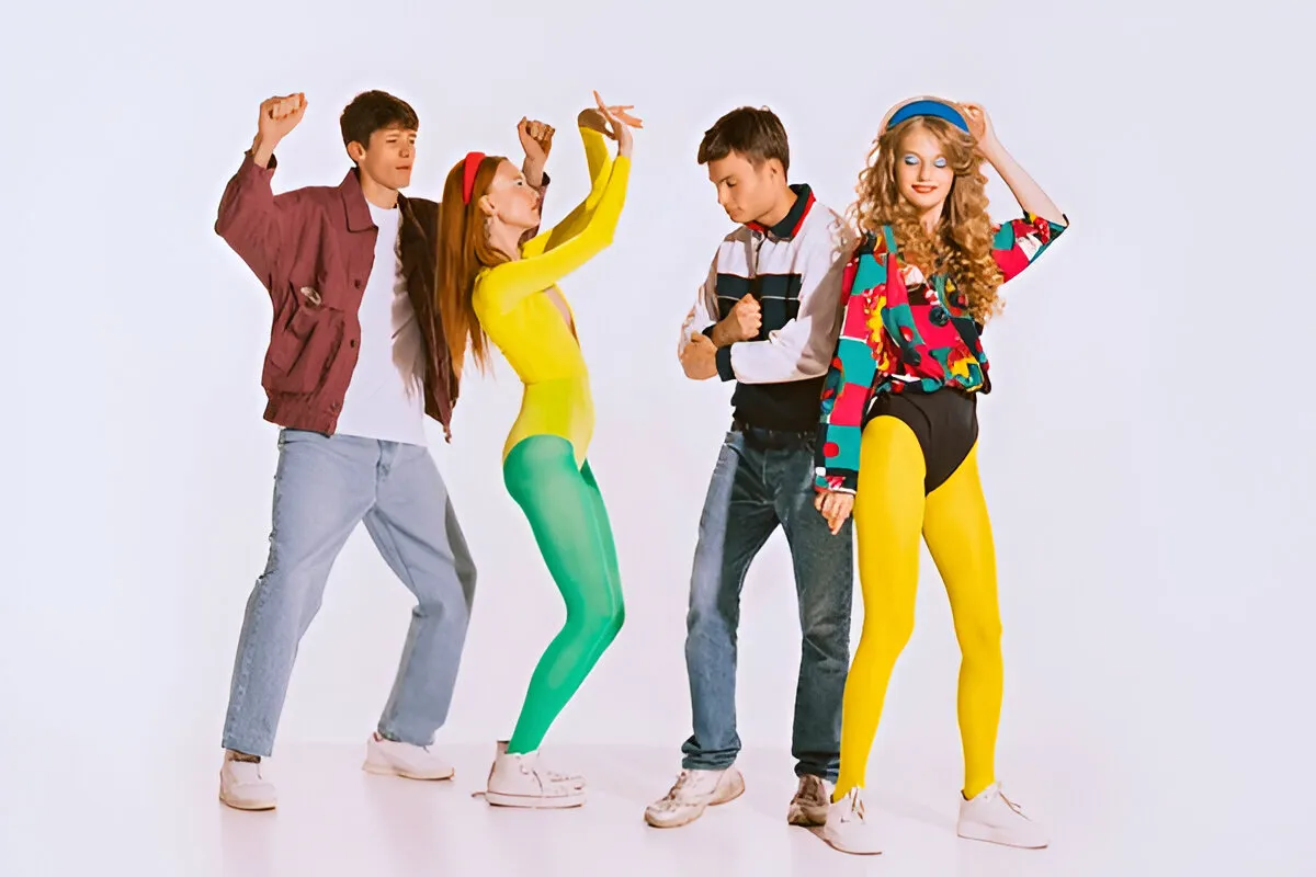 Modern reinterpretation of 1980s fashion trends like high-waisted jeans and blazers