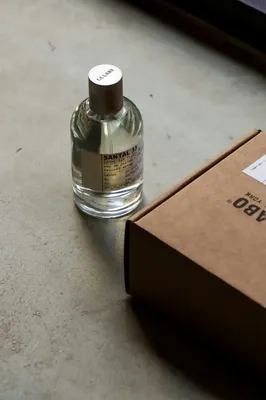 Le Labo Santal 33 perfume bottle with vintage apothecary look E