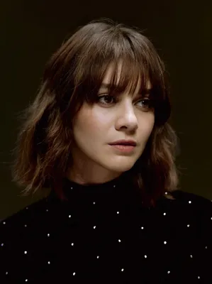 Emma Watson French bob with bangs and chic style