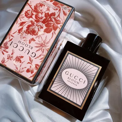 Gucci Bloom perfume bottle with floral design