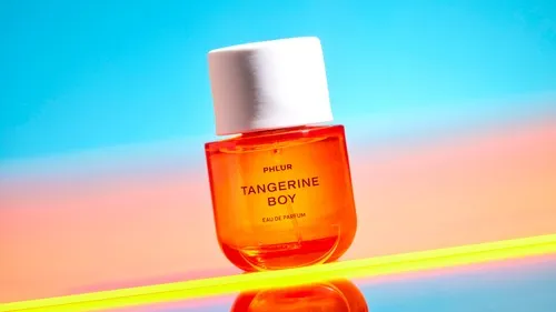 Phlur Tangerine Boy perfume bottle with citrus-inspired look