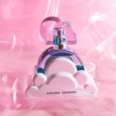Ariana Grande Cloud Eau de Parfum perfume bottle with cloud-shaped cap and pastel colors