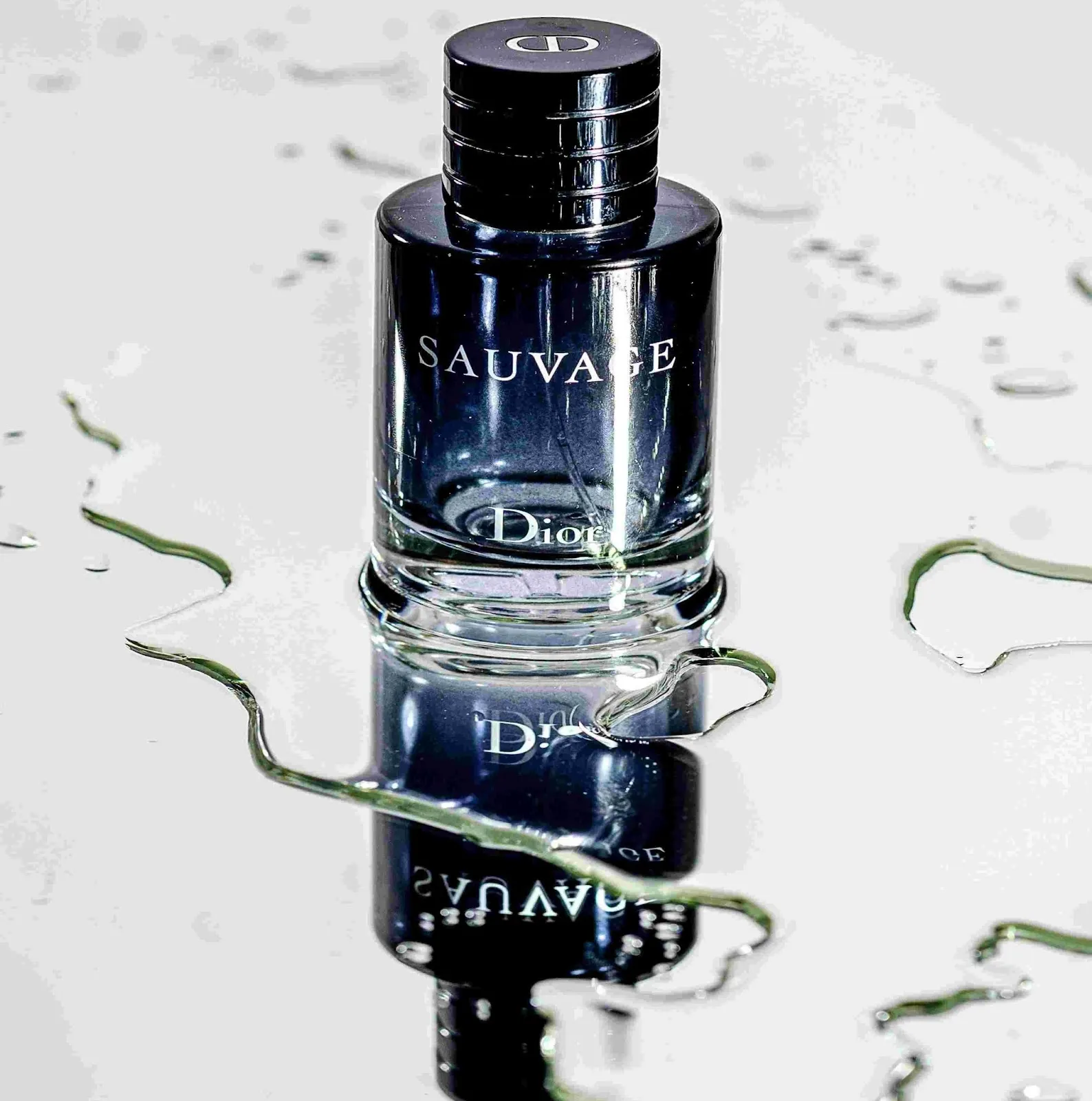 Dior Sauvage bottle in a rugged outdoor setting, reflecting bold and magnetic masculinity.